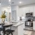 Spacious kitchen with island and bar top seating